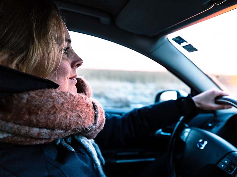 Female mature driver in car