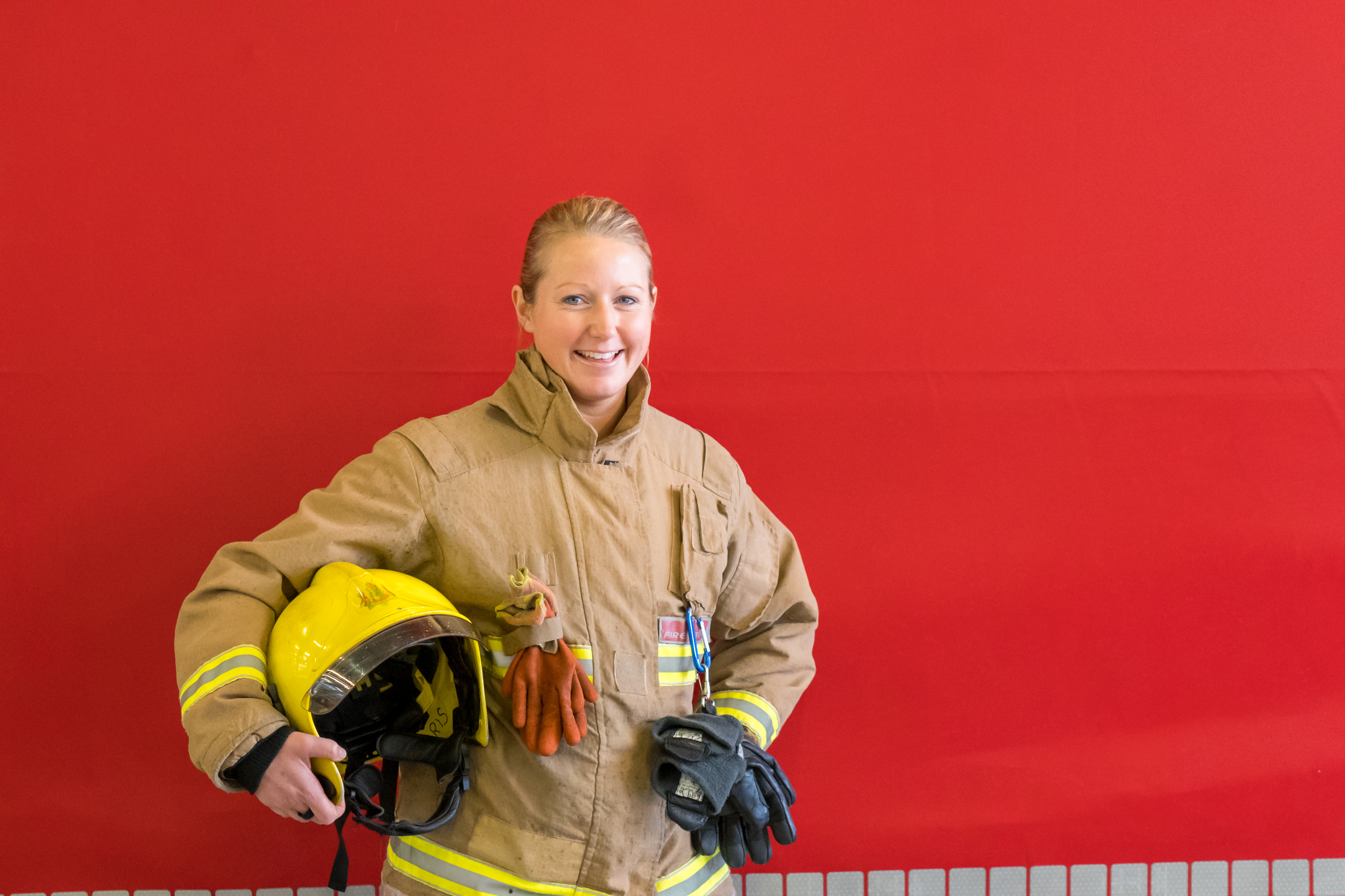 Female firefighter smiling