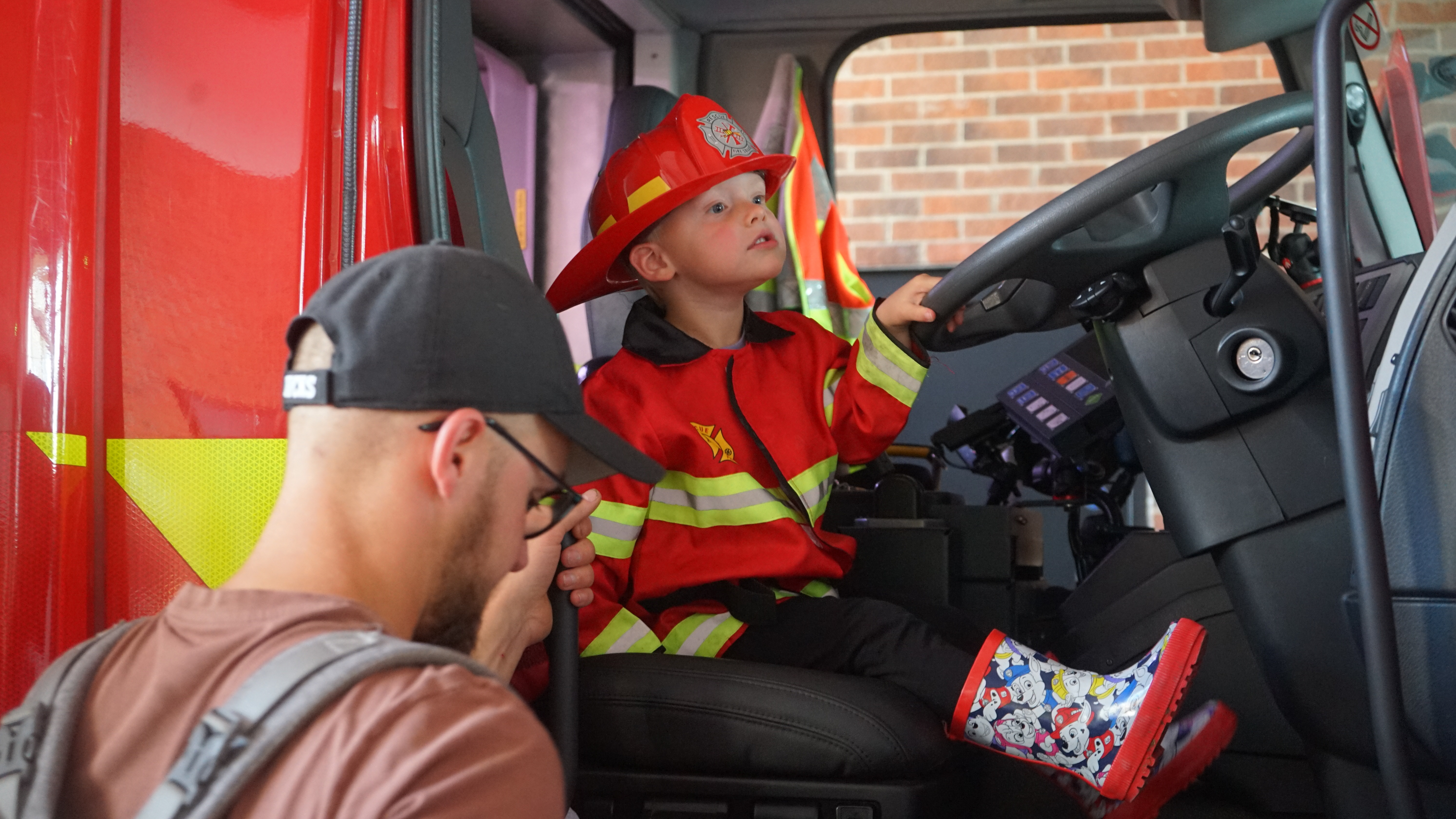 Boy in fire appliance